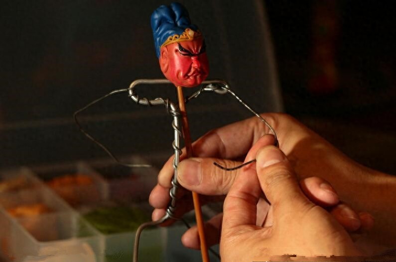 捏面人:是捏制的创作艺术,已很少作为食物出现